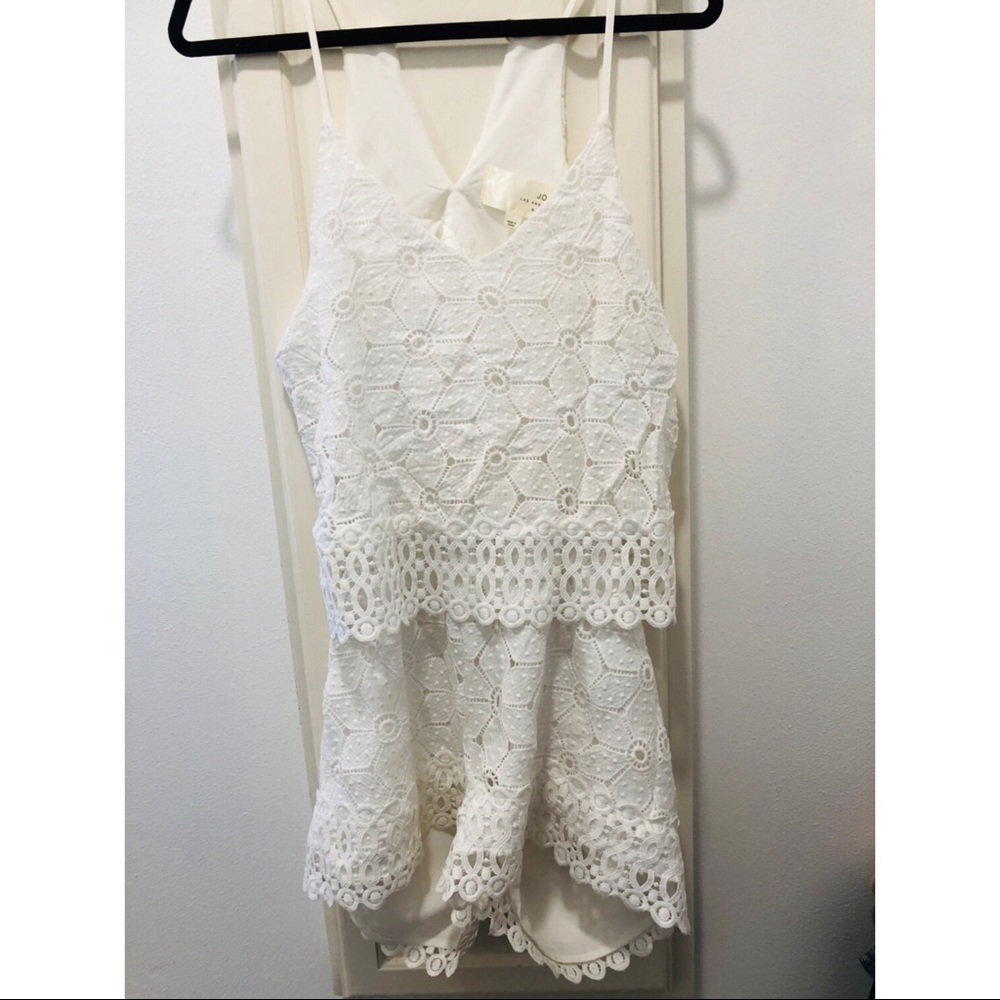 Lace romper with adorable back